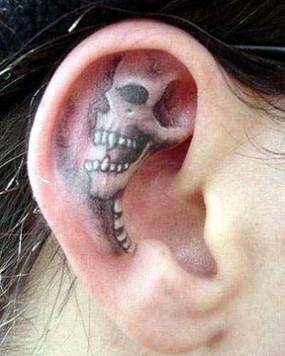Tags: body art, ear, photo, skulls, tattoo